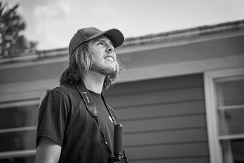 Parker looking out on set of The Collins Film photo credit: Jordan Skutar